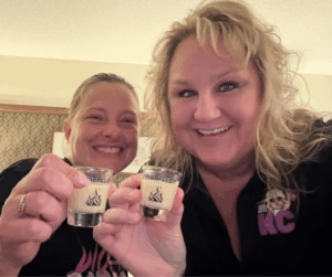 LIZ, our Longest Standing Fireballer, with KC! Cheers with our Fireballer Shot Glasses!